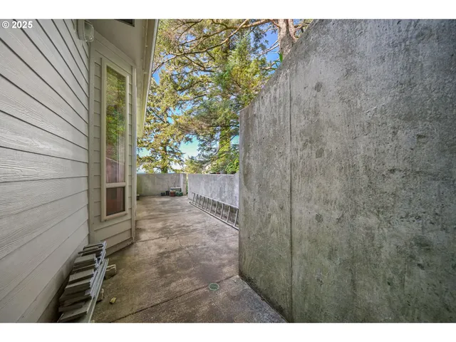 a view of a house with a tree