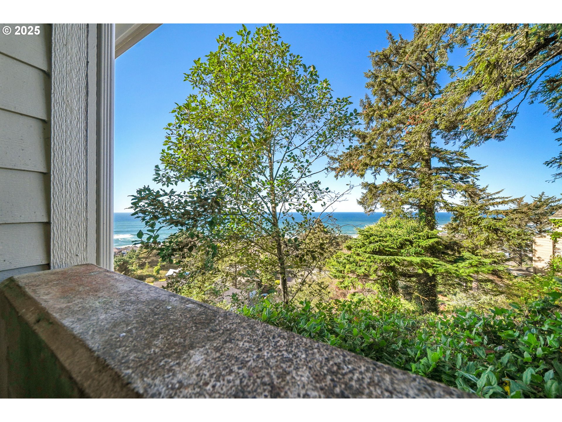 674 Pacific View Drive Yachats, OR 97498 - Photo 40 of 47 a view of a house with a tree