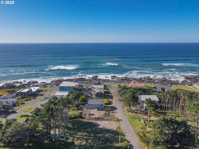 a view of a city with an ocean