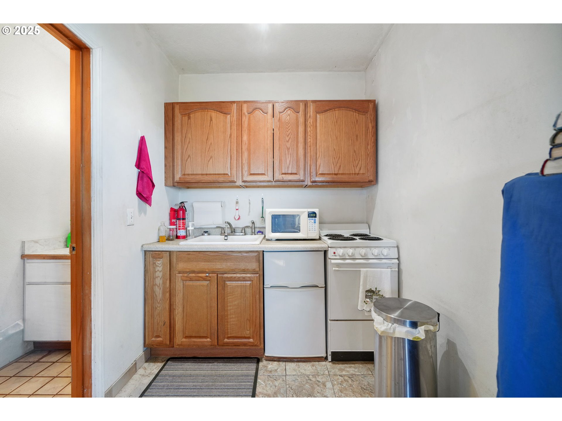 674 Pacific View Drive Yachats, OR 97498 - Photo 43 of 47 a utility room with cabinets washer and dryer