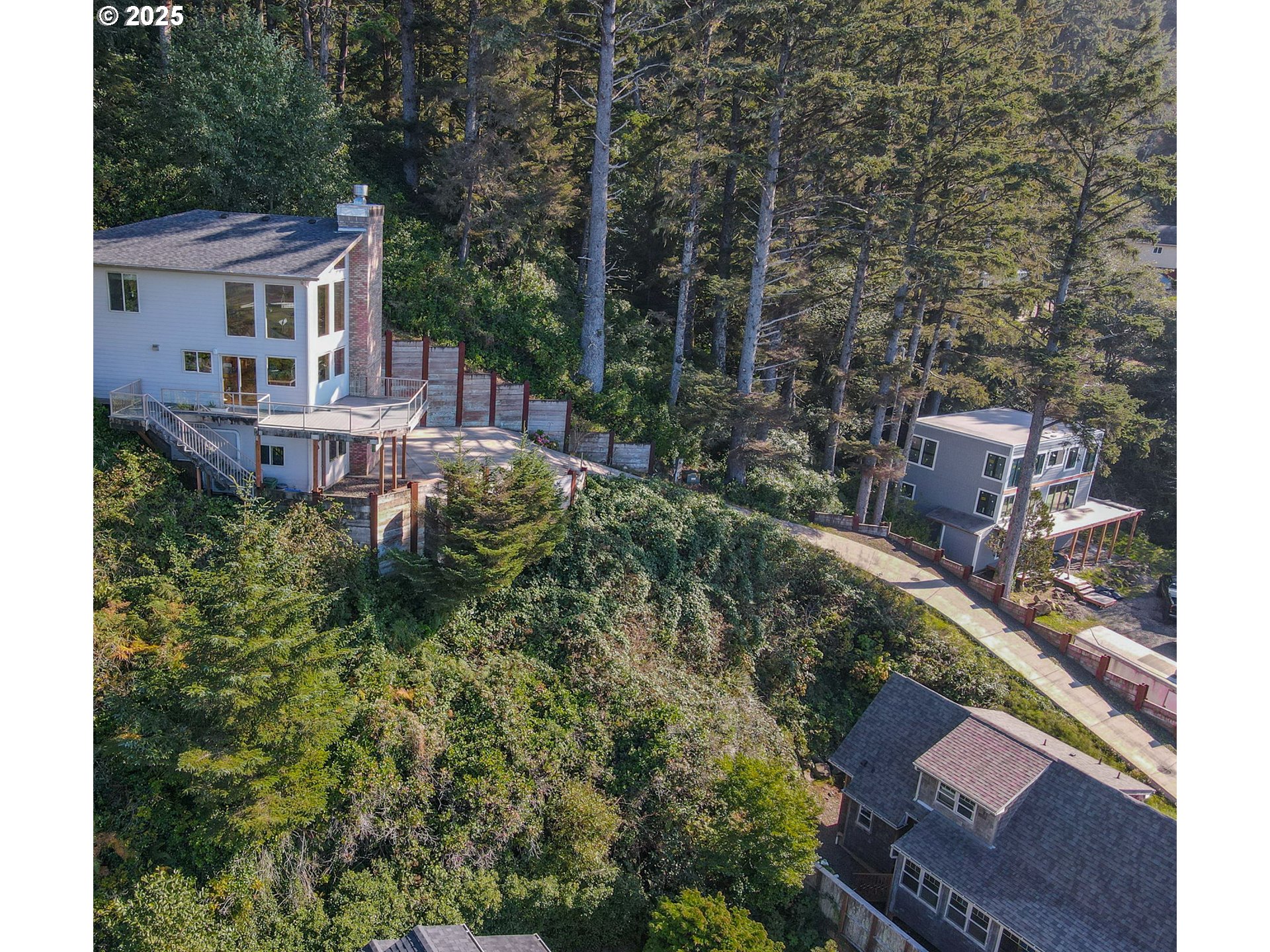 674 Pacific View Drive Yachats, OR 97498 - Photo 46 of 47 an aerial view of a house with a yard