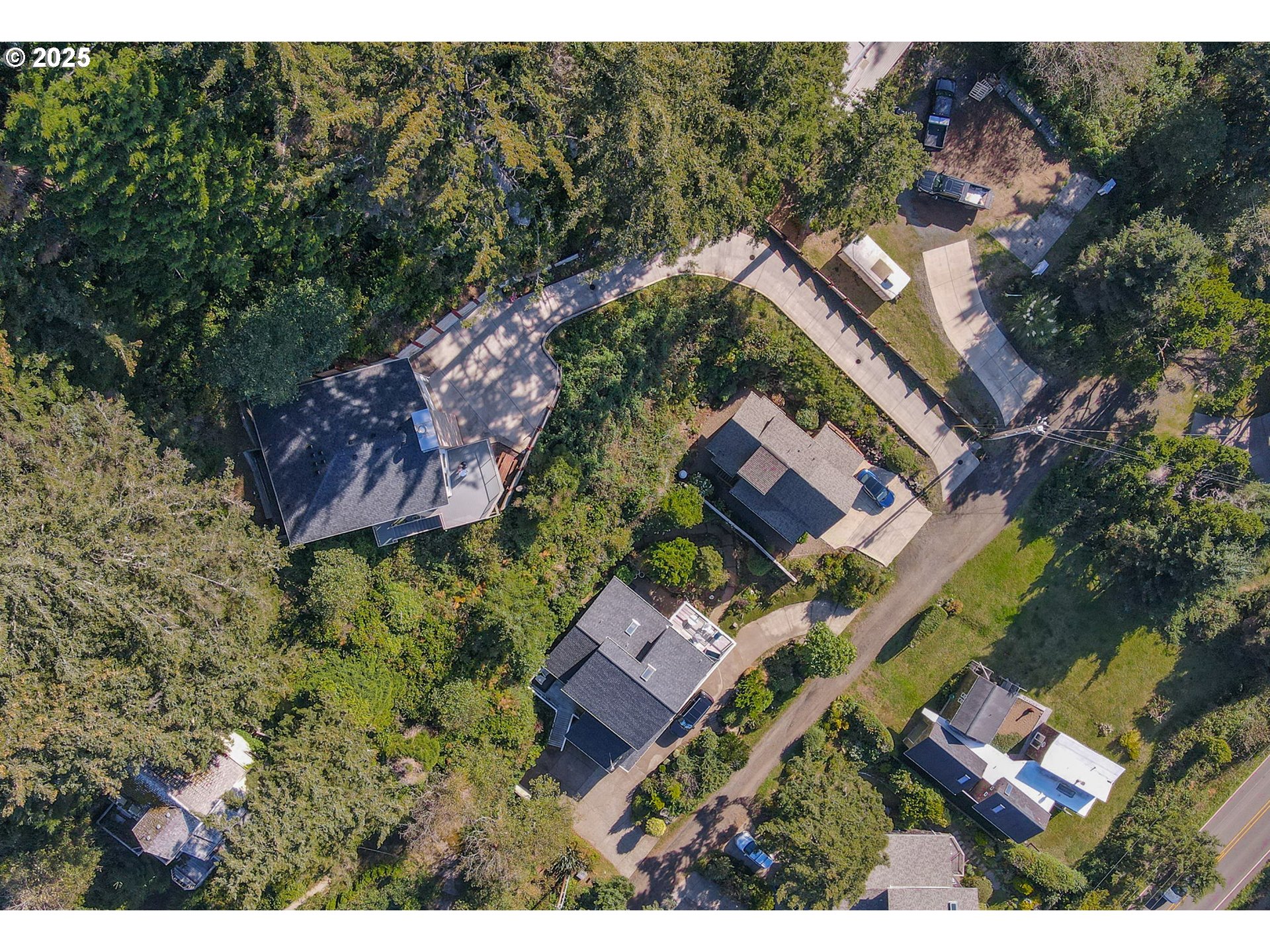 674 Pacific View Drive Yachats, OR 97498 - Photo 47 of 47 an aerial view of house with yard swimming pool and outdoor seating