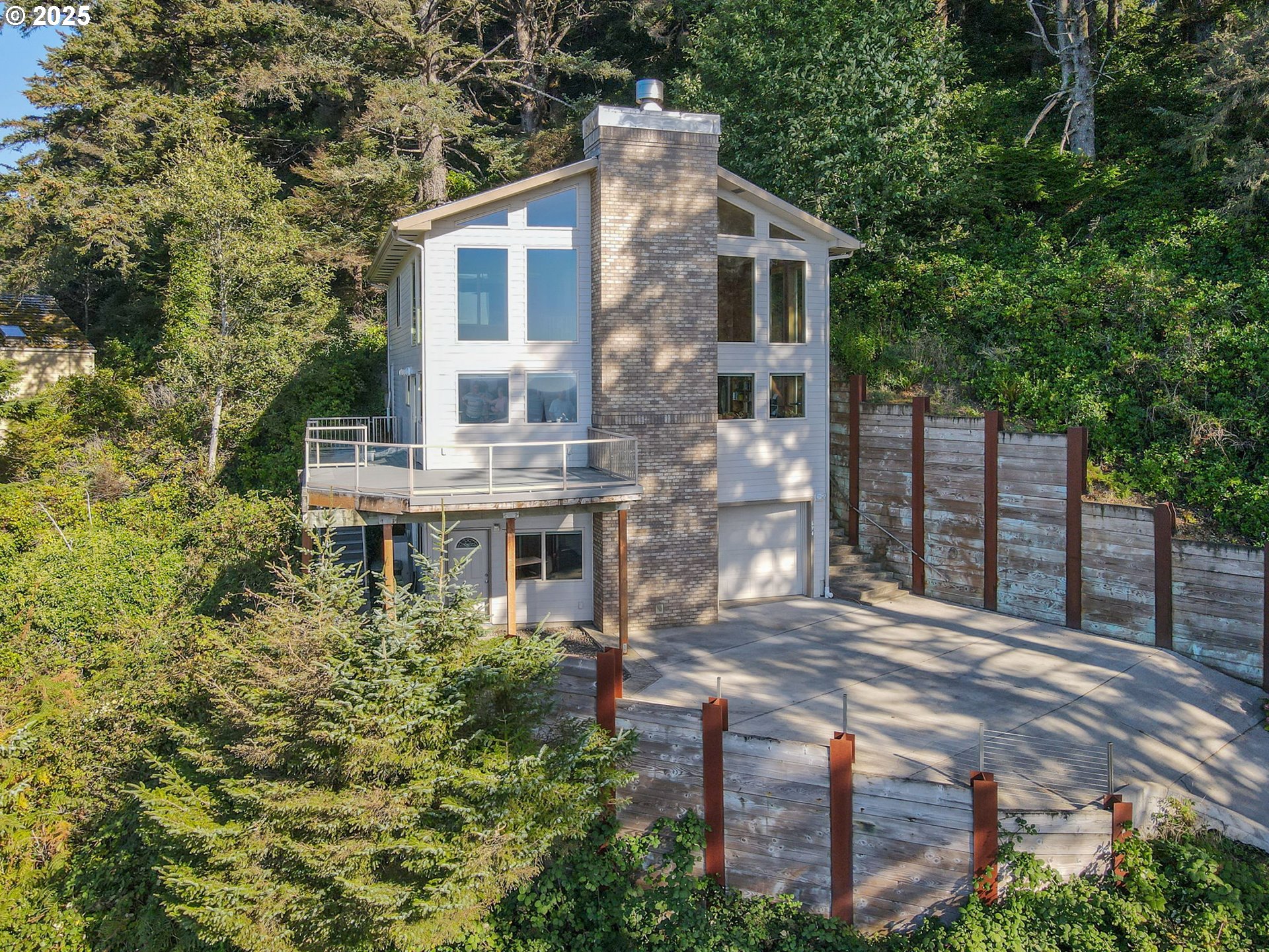 674 Pacific View Drive Yachats, OR 97498 - Photo 6 of 47 a house view with a outdoor space