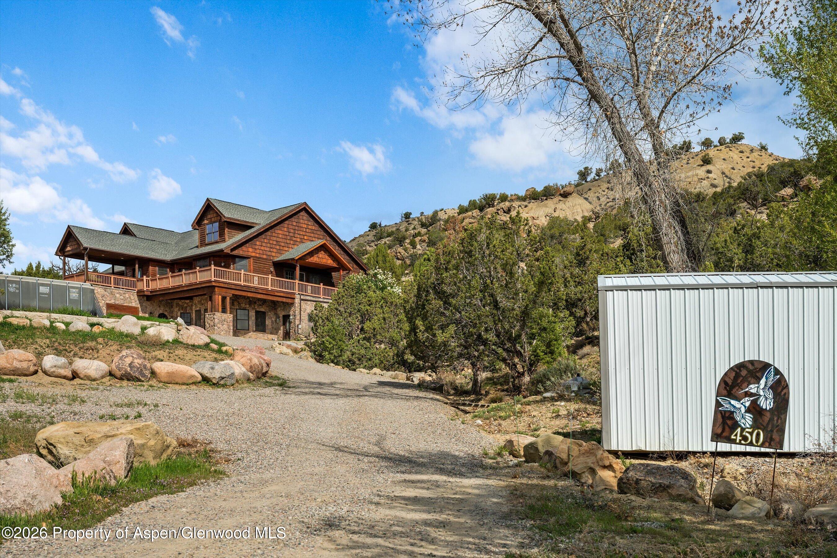 450 Summer Falls Road Silt, CO 81652 - Photo 48 of 50 a front view of a house with a yard