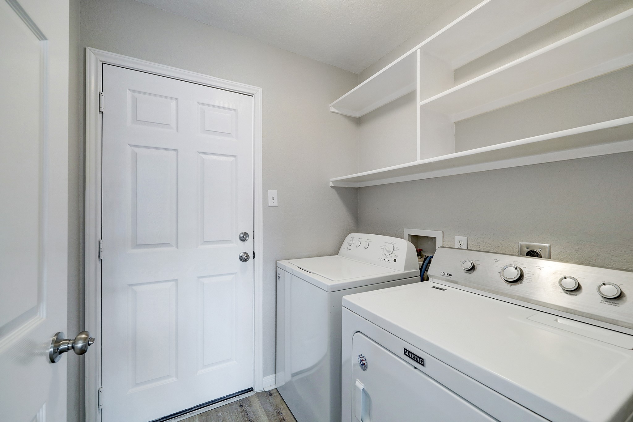 24031 Holleygate Court Spring, TX 77373 - Photo 16 of 17 a utility room with dryer and washer