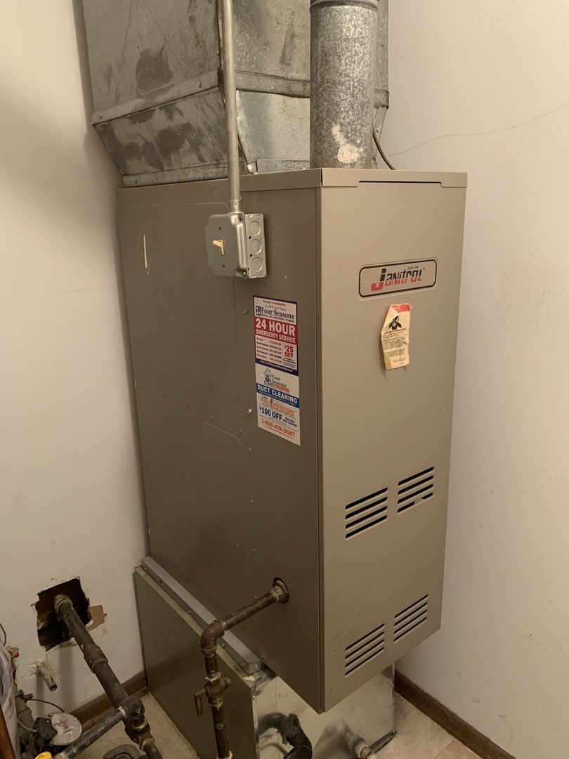 7 Red Barn Road, Unit 107 Matteson, IL 60443 - Photo 14 of 15 a close view of a refrigerator in kitchen