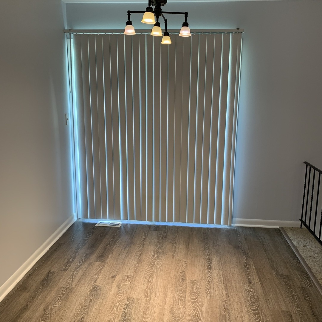 7 Red Barn Road, Unit 107 Matteson, IL 60443 - Photo 6 of 15 a view of a room with wooden floor