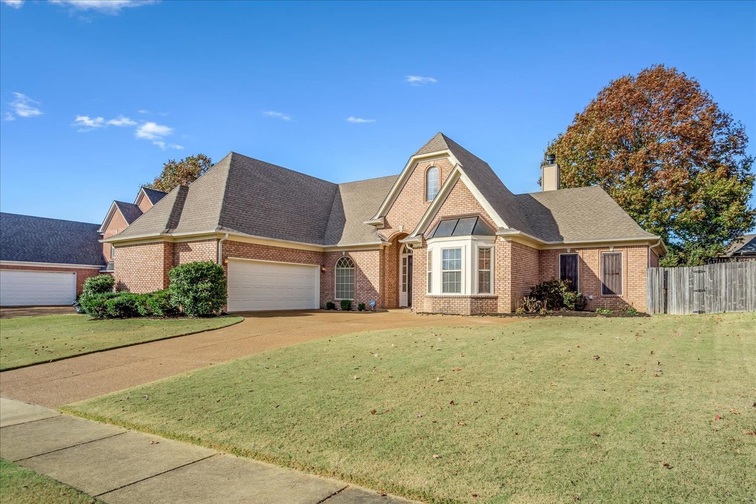 9178 Wilderridge Lane Memphis, TN 38018 - Photo 2 of 31 a view of a house with a yard