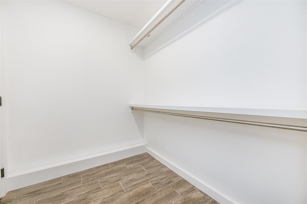 2006 Borger Plainview, TX 79072 - Photo 13 of 27 a view of small space with racks on the wall