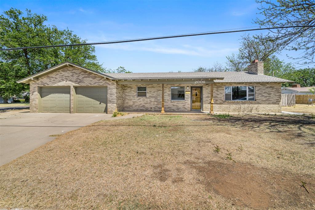 2006 Borger Plainview, TX 79072 - Photo 20 of 27 a front view of a house with a yard