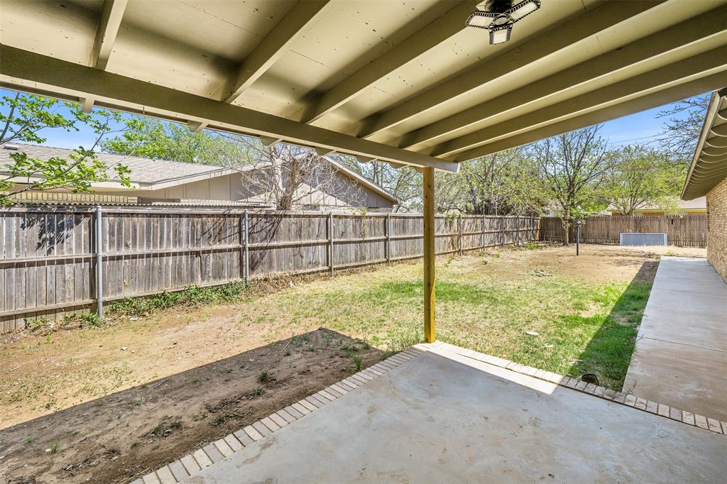 2006 Borger Plainview, TX 79072 - Photo 22 of 27 a view of backyard with wooden fence