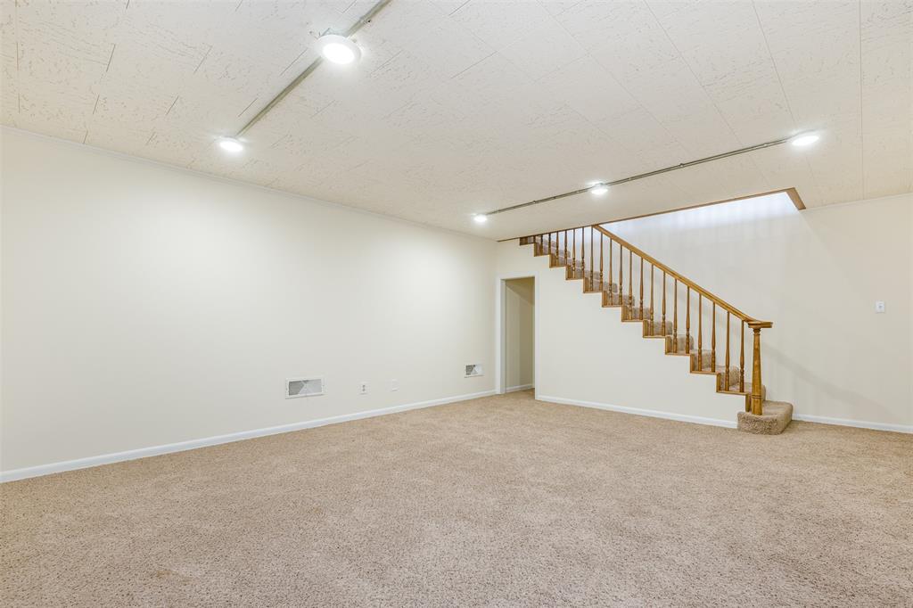 2006 Borger Plainview, TX 79072 - Photo 5 of 27 a view of an empty room with stairs