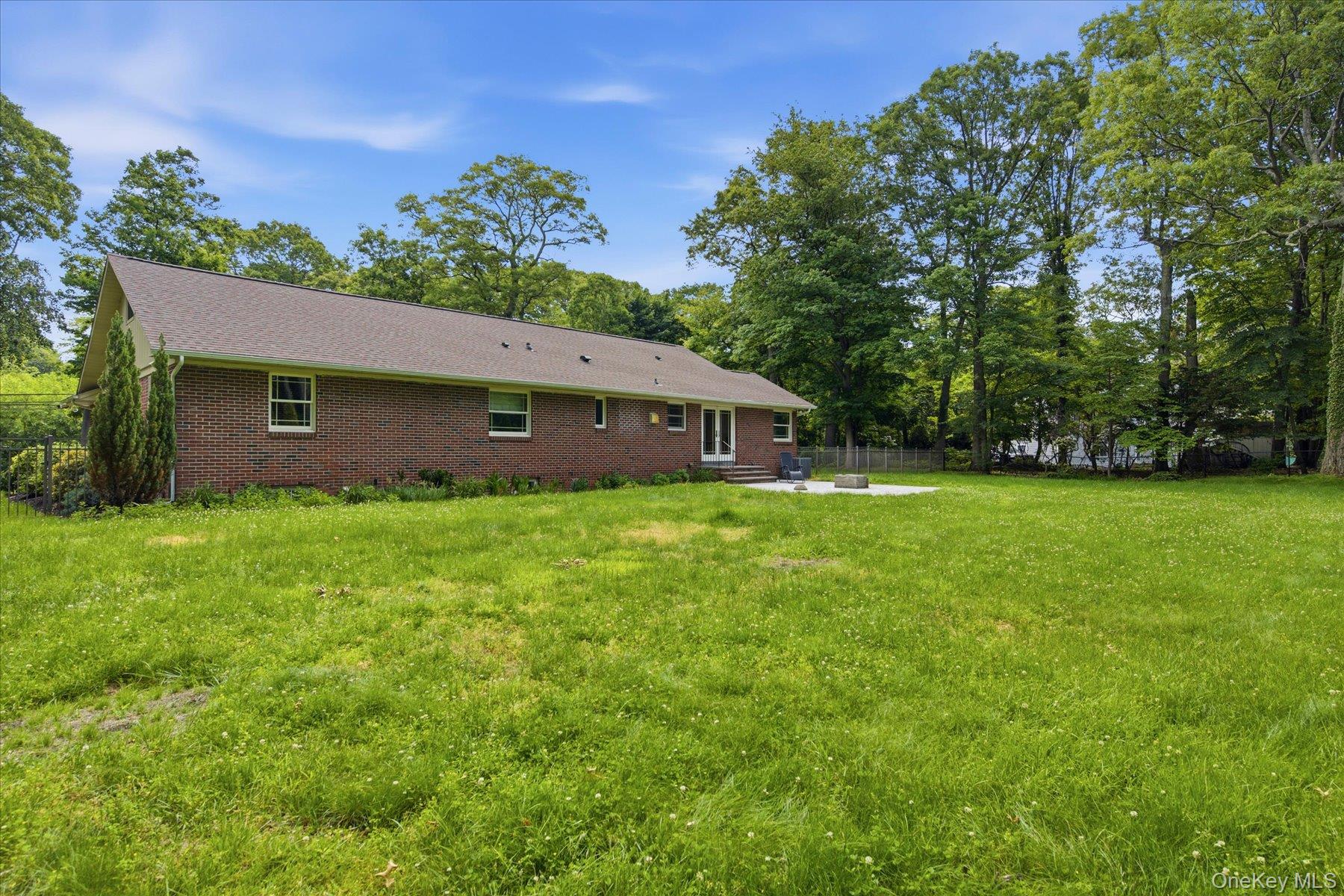 42 Cliff Road Port Jefferson, NY 11777 - Photo 22 of 22 a front view of house with a garden