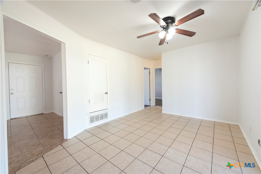 1201 Ridgemont Drive Killeen, TX 76549 - Photo 16 of 21 a view of an empty room and chandelier fan