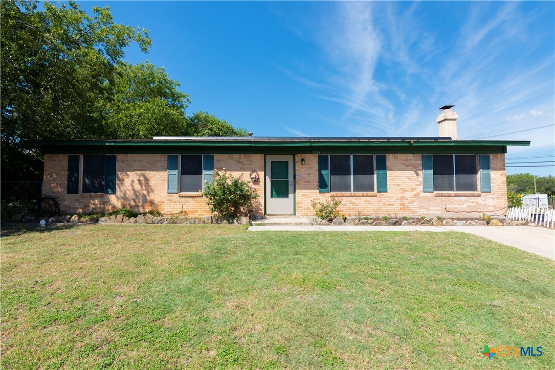 1201 Ridgemont Drive Killeen, TX 76549 - Photo 2 of 21 a front view of house with yard and outdoor seating