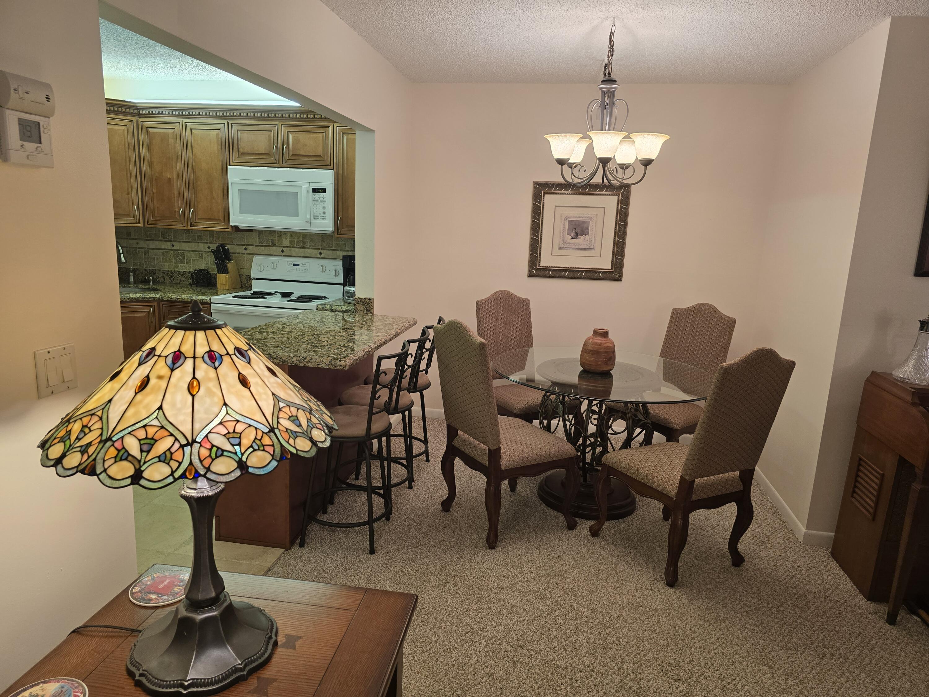 317 Pine Ridge Circle Greenacres, FL 33463 - Photo 9 of 51 dinning / living roomroom
