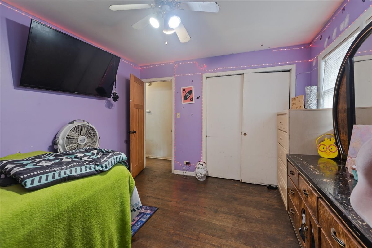 1246 Thomas Street Homewood, IL 60430 - Photo 12 of 29 a bedroom with furniture and a flat screen tv