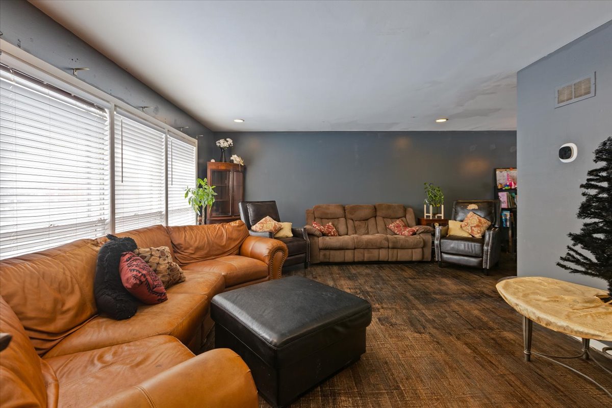 1246 Thomas Street Homewood, IL 60430 - Photo 2 of 29 a living room with furniture and a couch