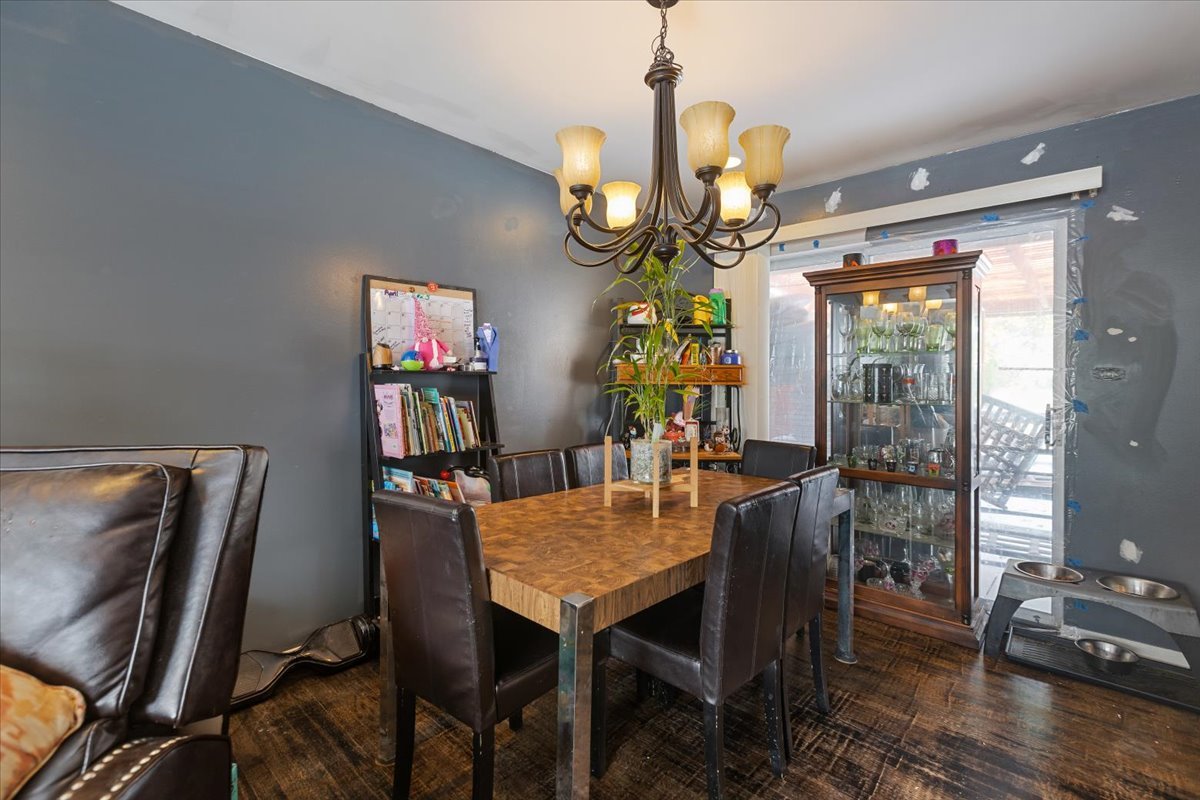 1246 Thomas Street Homewood, IL 60430 - Photo 5 of 29 a view of a dining room with furniture wooden floor and chandelier
