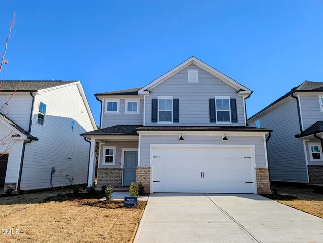 an empty room with closet and bathroom