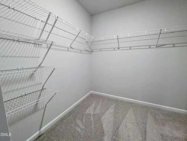 a view of a floor to ceiling window with an outdoor space