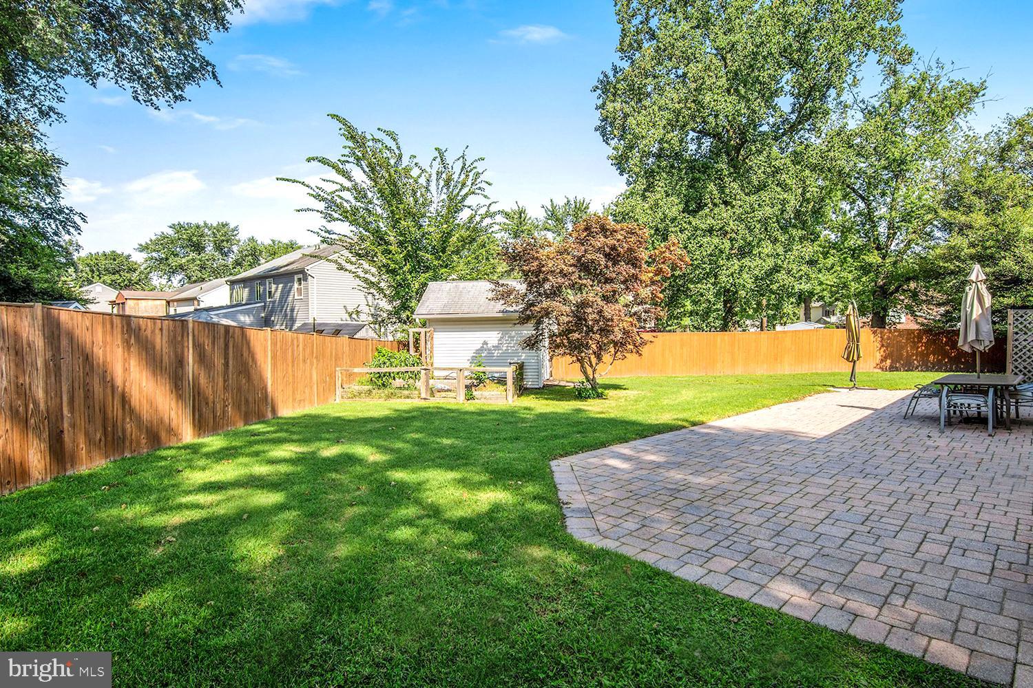 8479 Sexton Road Pasadena, MD 21122 - Photo 18 of 35 Paver Dining/Grilling Patio . Privacy Fenced Yard