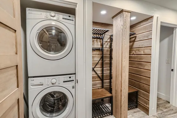 a view of a hallway with washer and dryer
