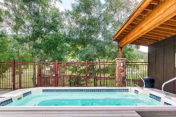 a view of outdoor space with deck and furniture