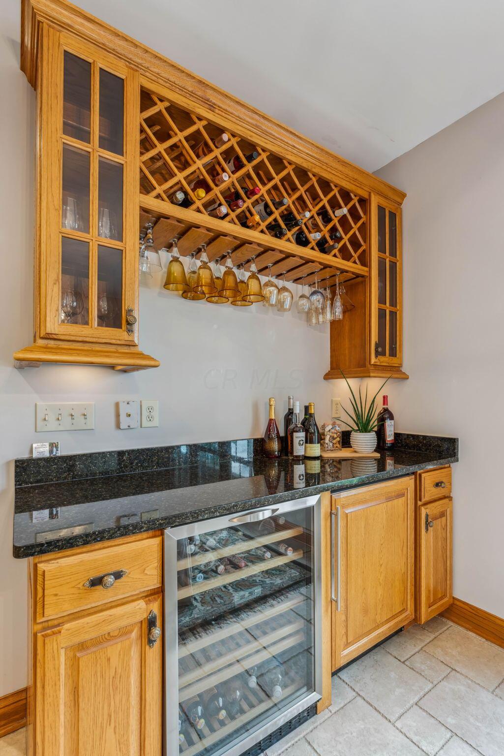 8242 Dustin Road Galena, OH 43021 - Photo 28 of 111 Butler's pantry area with wine cooler
