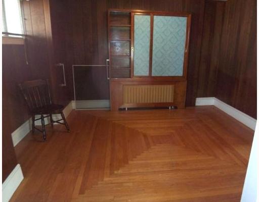 211 West Main Road Middletown, RI 02842 - Photo 3 of 3 Dining Room. Hardwood floors and cabinet