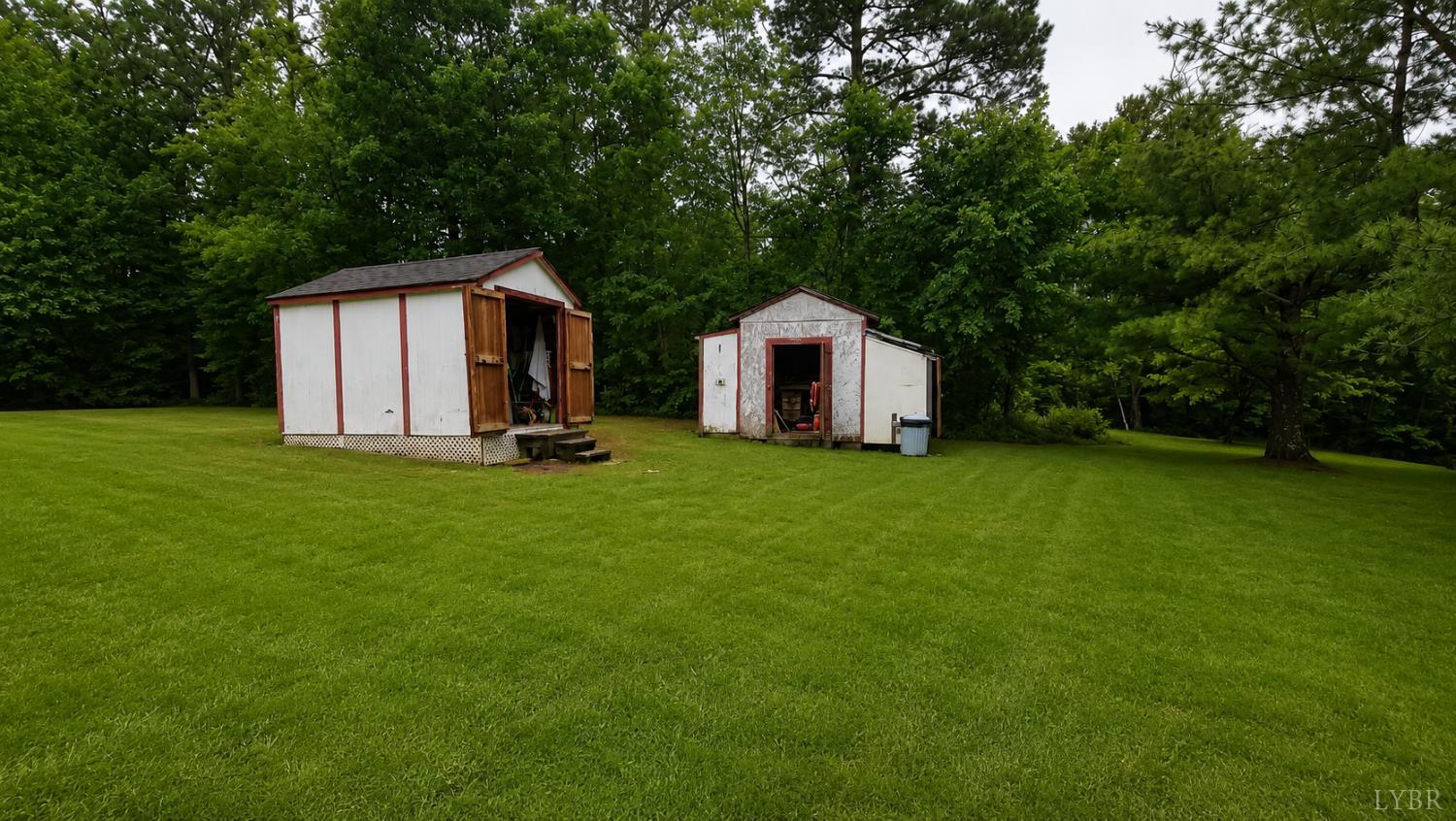2346 Mitchell Mill Road Gladys, VA 24554 - Photo 36 of 38 a view of a tiny house with backyard