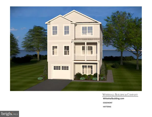 a view of a big house with a big yard