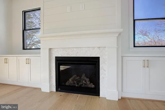 a living room with a fireplace