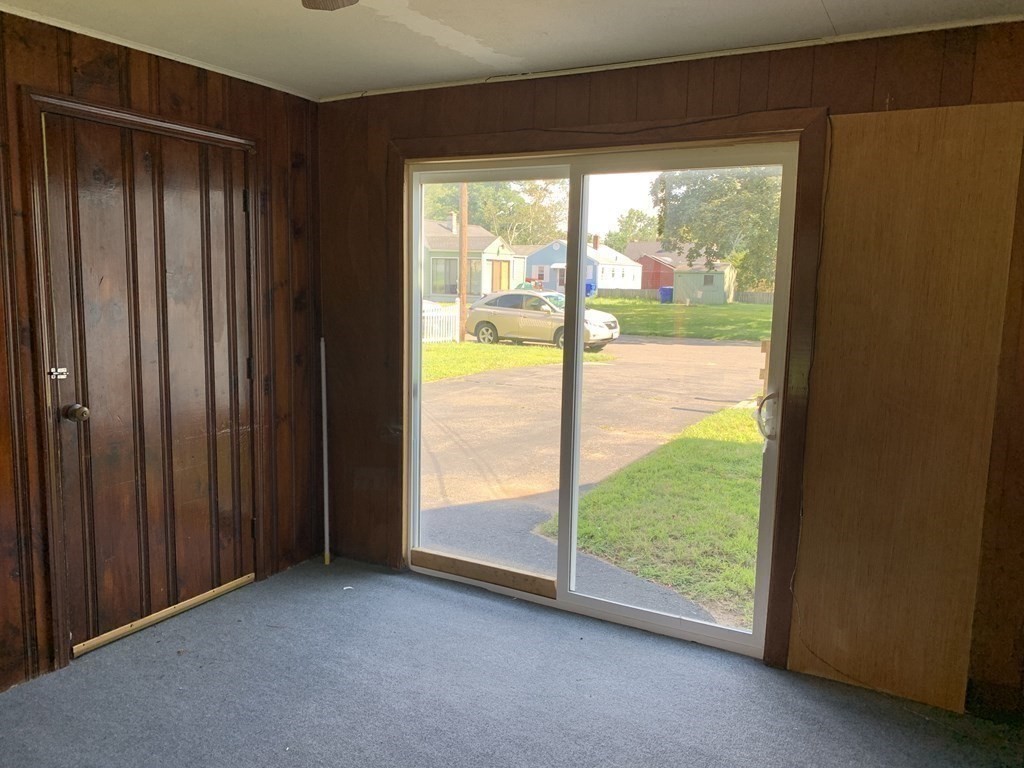 54 Fernald Street Springfield, MA 01109 - Photo 5 of 13 a view of an empty room and window