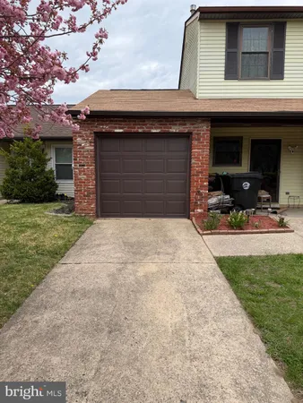 a front view of house with yard