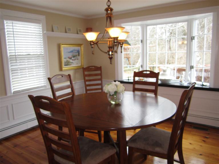 65 Bone Hill Road Barnstable, MA 02675 - Photo 12 of 34 a view of a dining room with furniture window and outside view