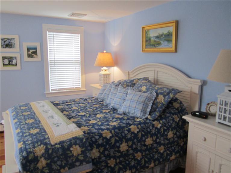 65 Bone Hill Road Barnstable, MA 02675 - Photo 24 of 34 a bed sitting in a bedroom next to a window