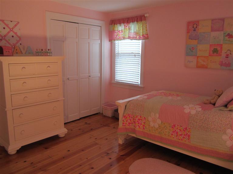 65 Bone Hill Road Barnstable, MA 02675 - Photo 31 of 34 a bed sitting in a bedroom next to a window