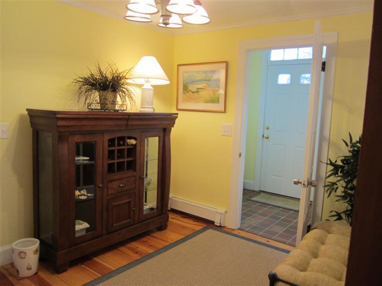 65 Bone Hill Road Barnstable, MA 02675 - Photo 4 of 34 a living room with furniture and a potted plant
