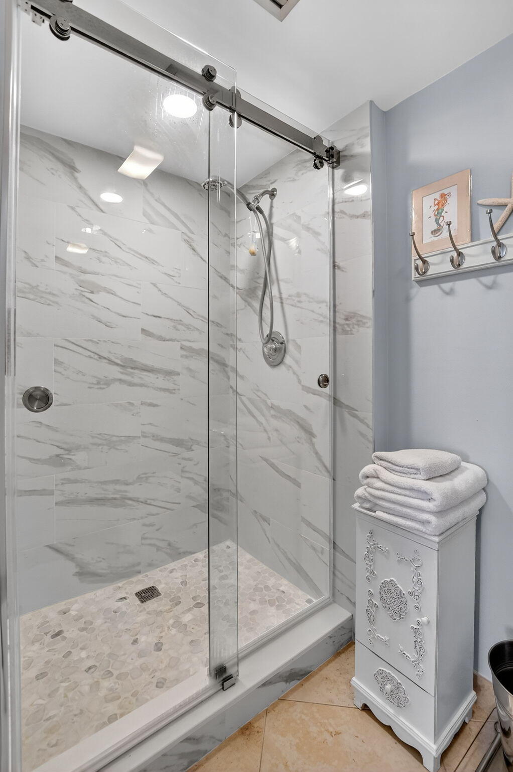 6205 Balboa Circle, Unit 403 Boca Raton, FL 33433 - Photo 21 of 41 a bathroom with a shower