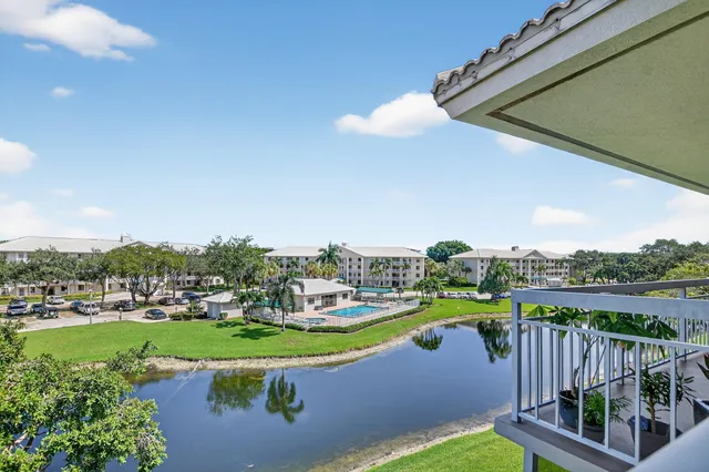 a view of a lake with a garden