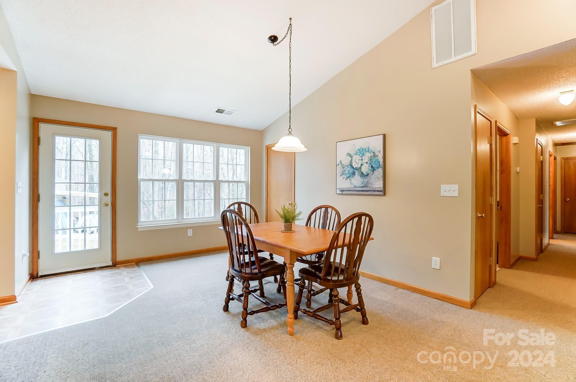 5312 Addison Road Waxhaw, NC 28173 - Photo 11 of 48 a view of a dining room with furniture and window