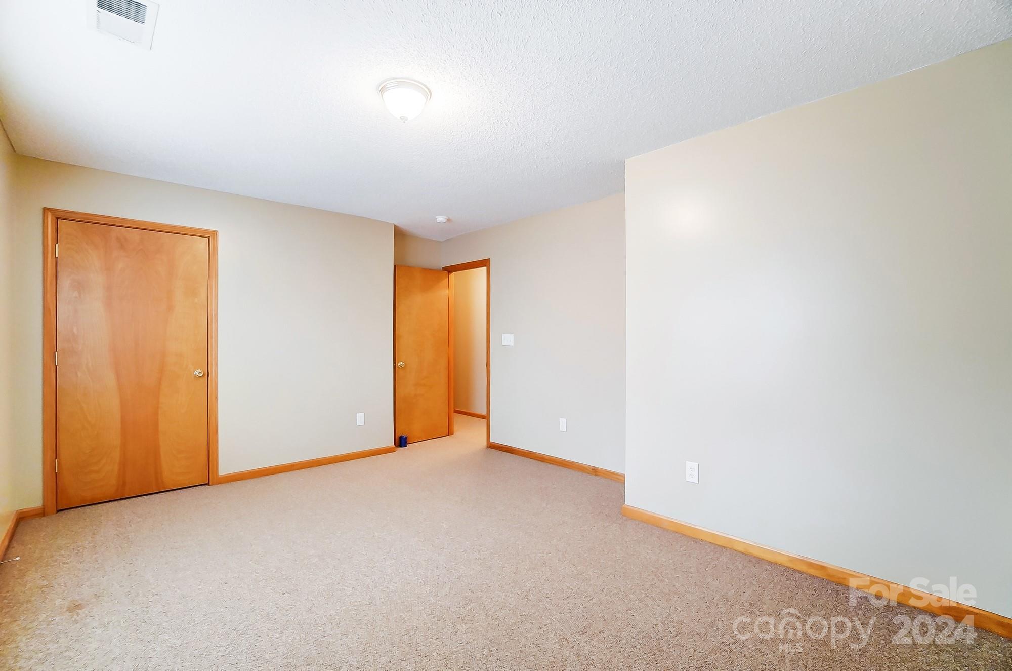 5312 Addison Road Waxhaw, NC 28173 - Photo 26 of 48 an empty room with a natural light