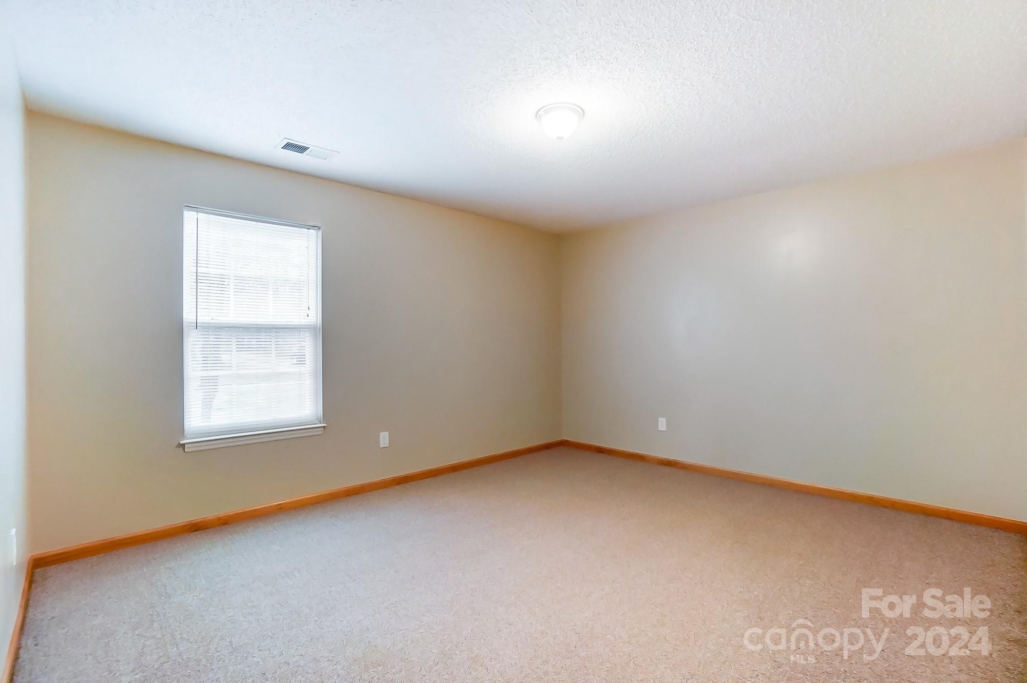 5312 Addison Road Waxhaw, NC 28173 - Photo 29 of 48 an empty room with a window
