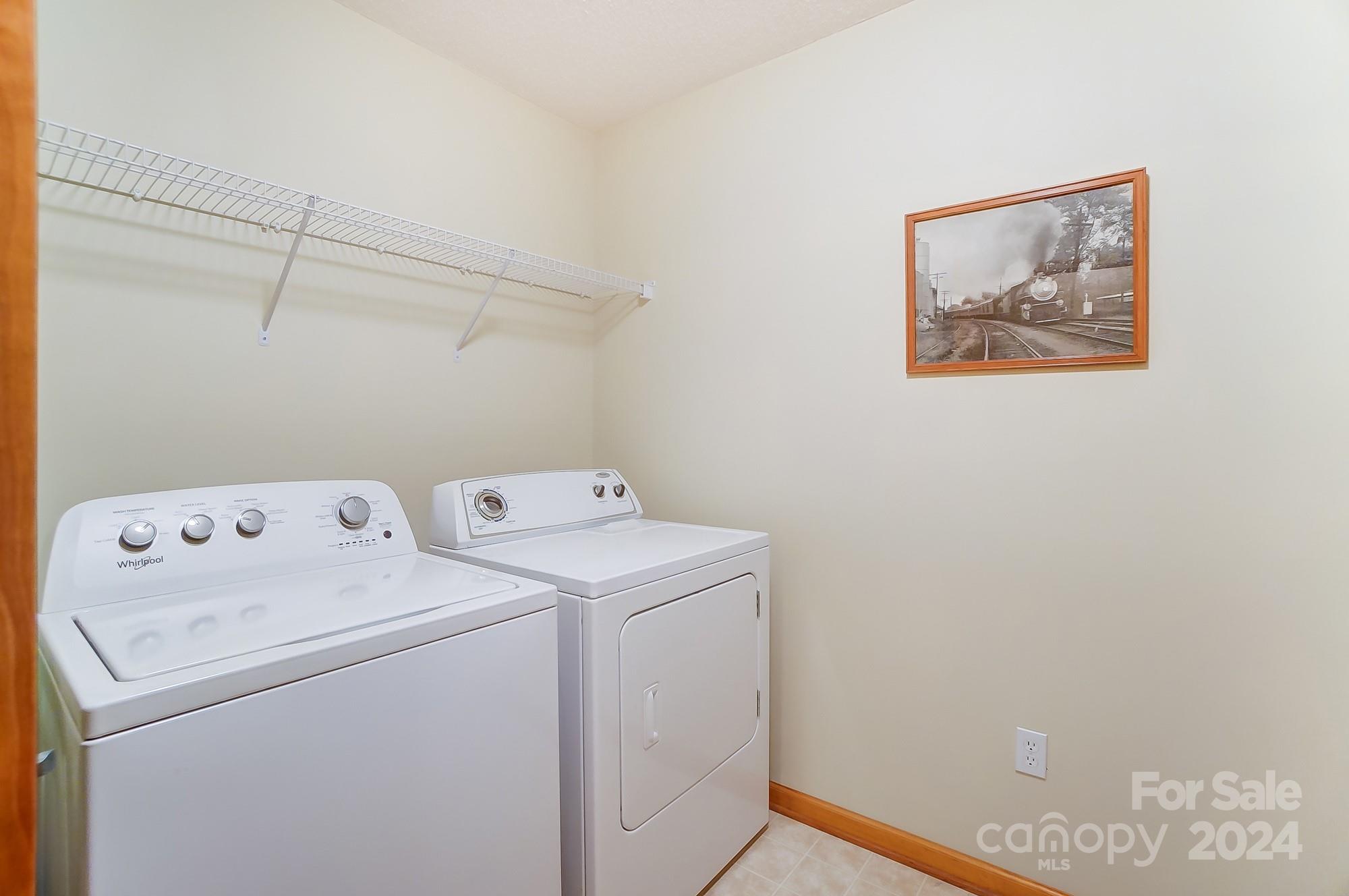 5312 Addison Road Waxhaw, NC 28173 - Photo 31 of 48 a utility room with dryer and washer