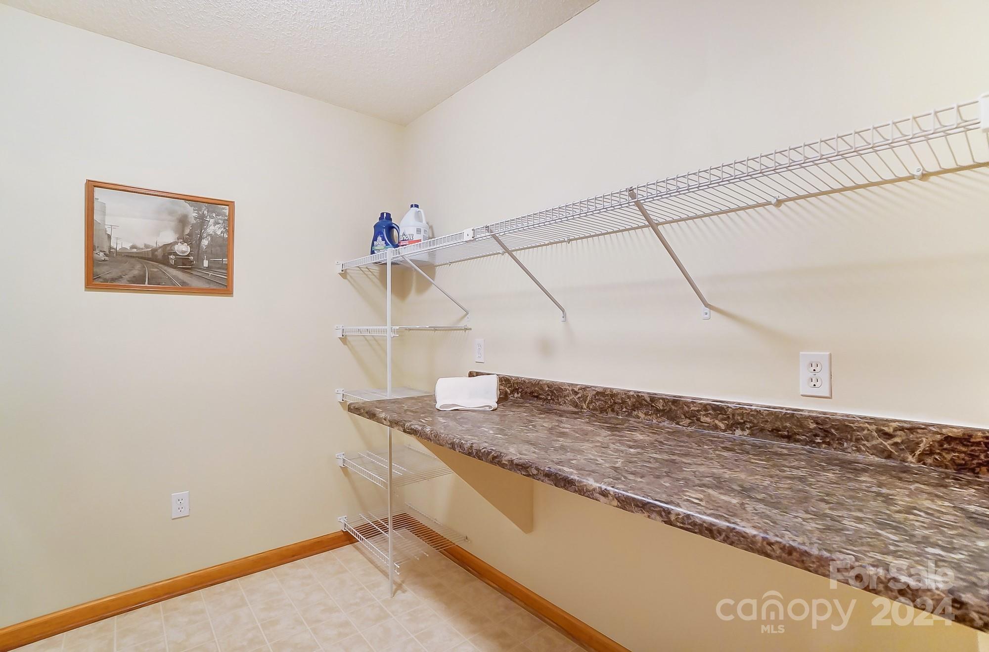 5312 Addison Road Waxhaw, NC 28173 - Photo 32 of 48 a view of a room with rack on the wall