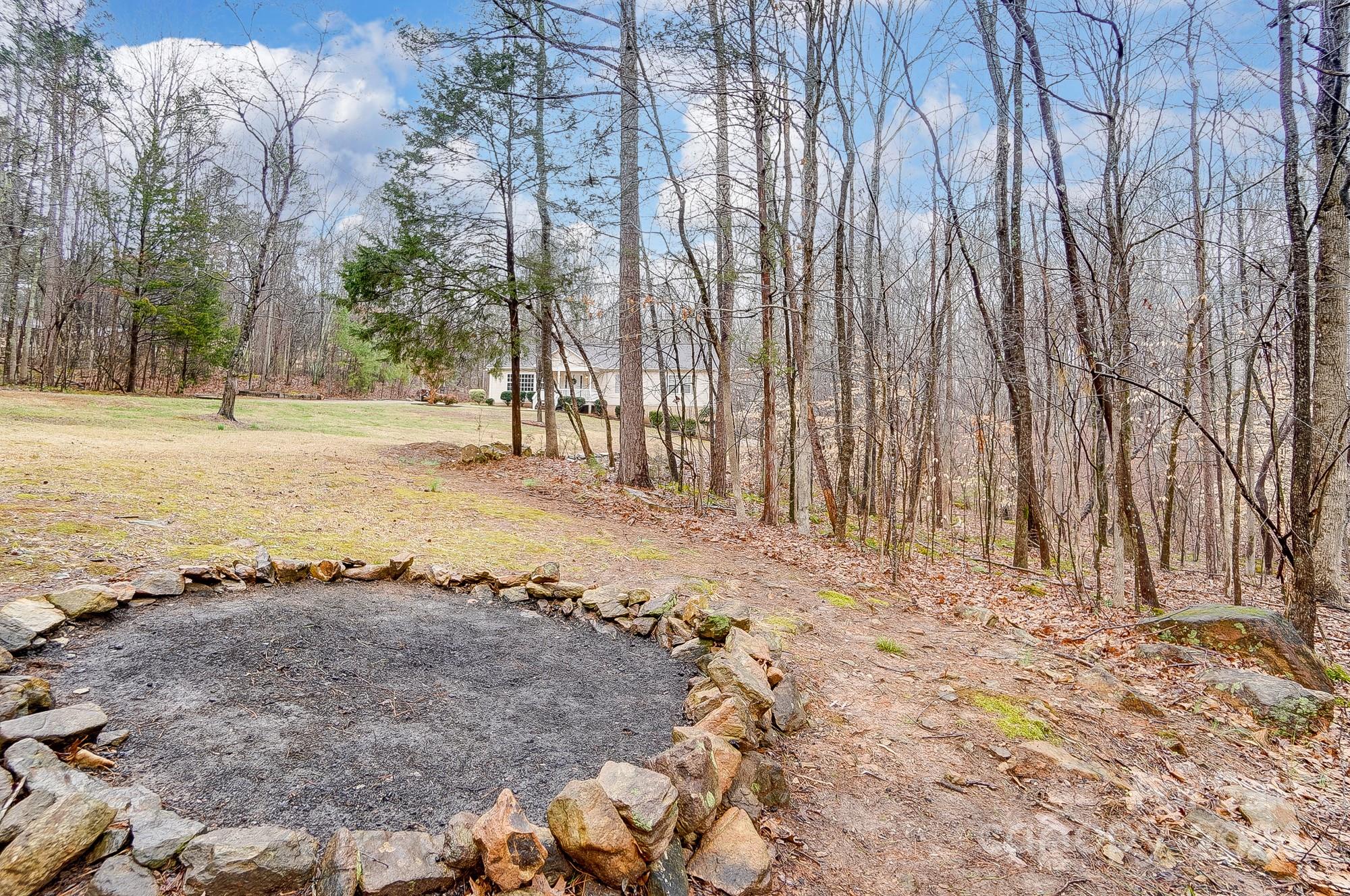 5312 Addison Road Waxhaw, NC 28173 - Photo 46 of 48 a view of an outdoor space with trees
