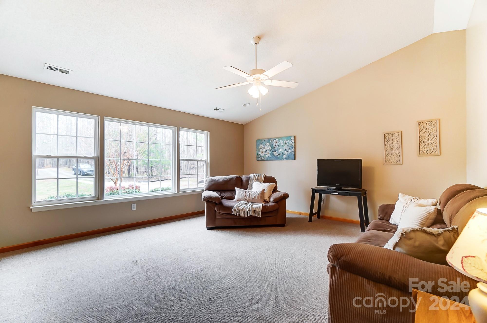 5312 Addison Road Waxhaw, NC 28173 - Photo 6 of 48 a living room with furniture and a window
