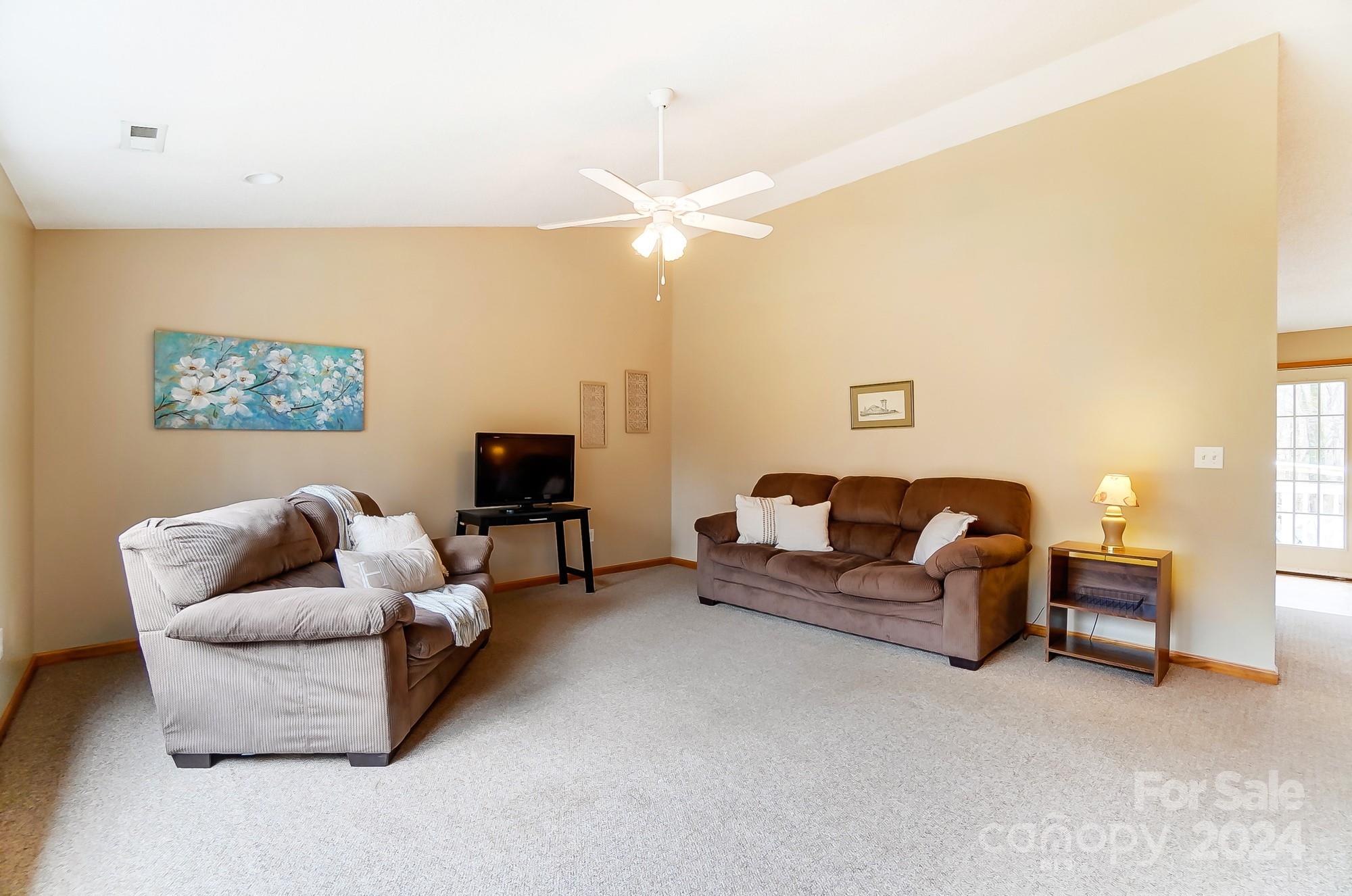 5312 Addison Road Waxhaw, NC 28173 - Photo 7 of 48 a living room with furniture and a couch