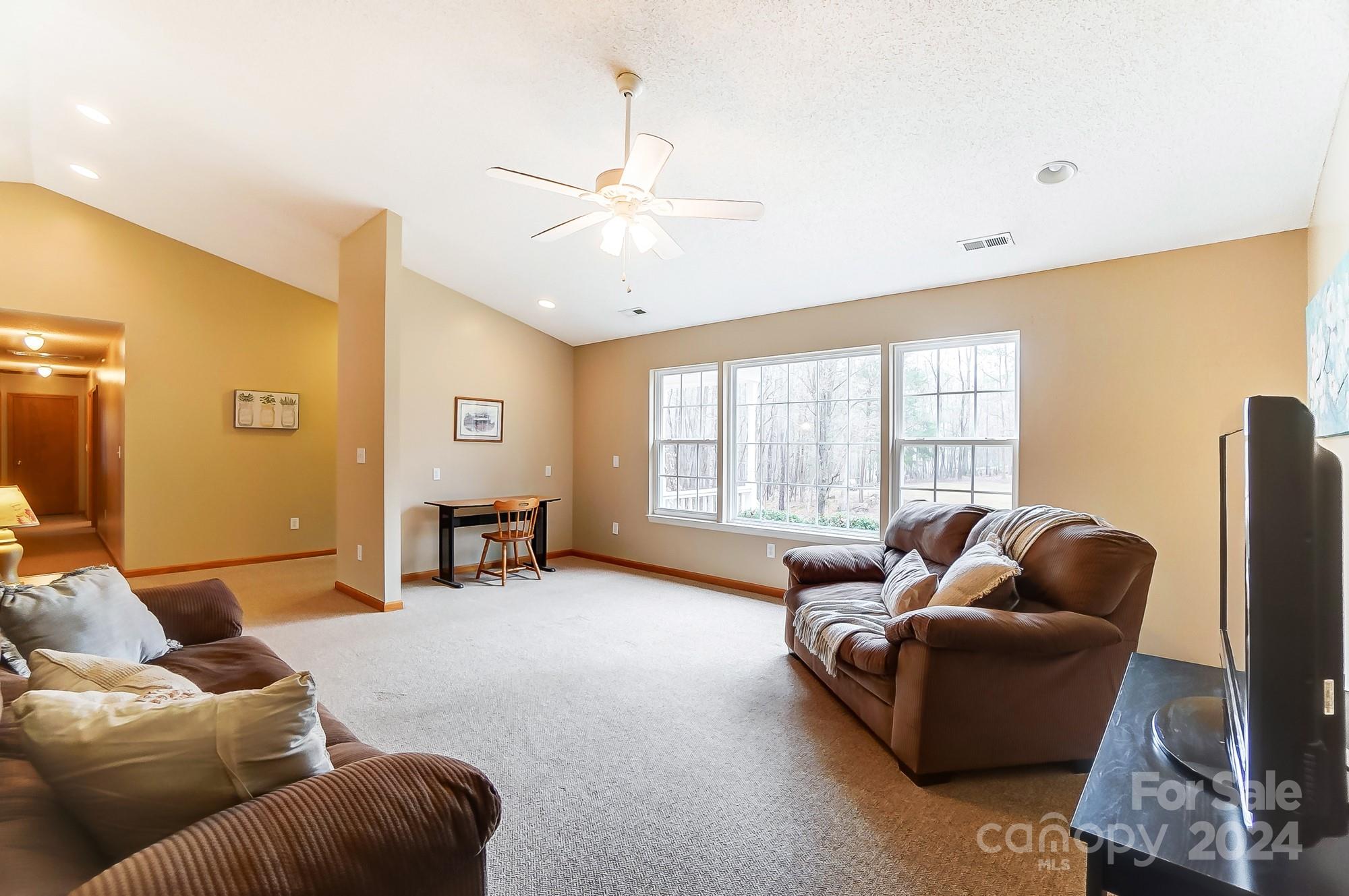 5312 Addison Road Waxhaw, NC 28173 - Photo 9 of 48 a living room with furniture and a window